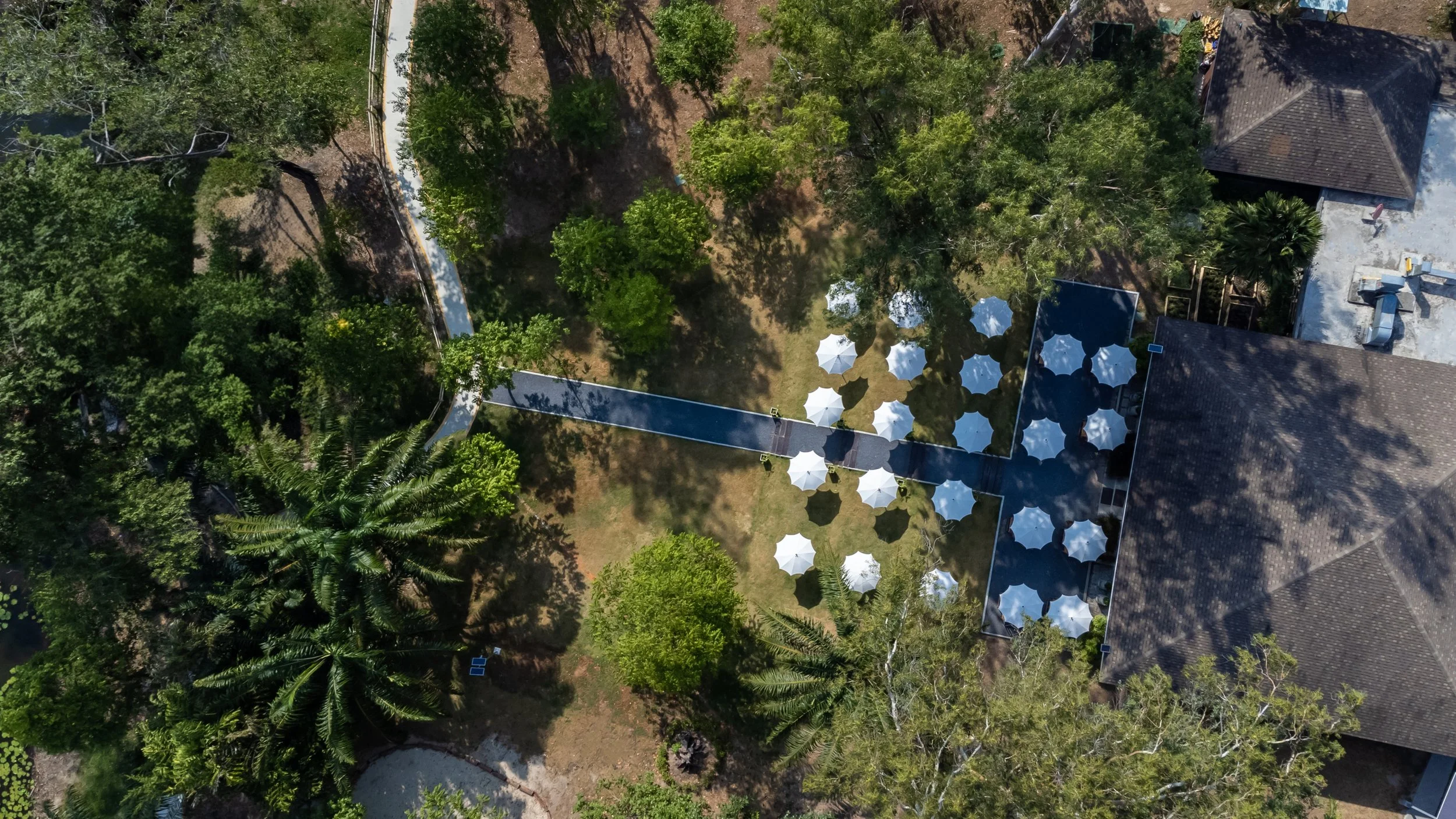 Aerial view of Open Kitchen Phuket and the surrounding Choeng Thale neighbourhood